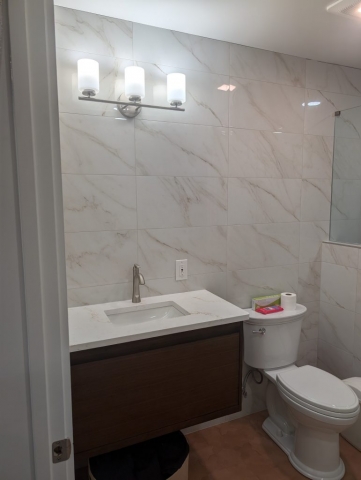 New bathroom tile and sink